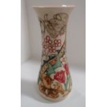 A Moorcroft tall baluster vase in "Golden Lily Ivory" pattern, WM Monogram, 31 cm.