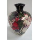 A Moorcroft baluster vase in "Ophelia's Flowers" pattern, 18.5 cm.