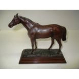 A mid 20th century Austrian bronze figure of a standing horse, naturalistic rectangular base,