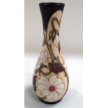 A Moorcroft baluster vase in "Yorkshire Rose" pattern, signed Sian Leeper, 21 cm.