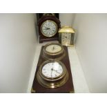 A Victorian polished slate and marble mantel clock,