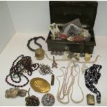 Contents to metal box - large quantity of assorted costume jewellery including simulated pearls,