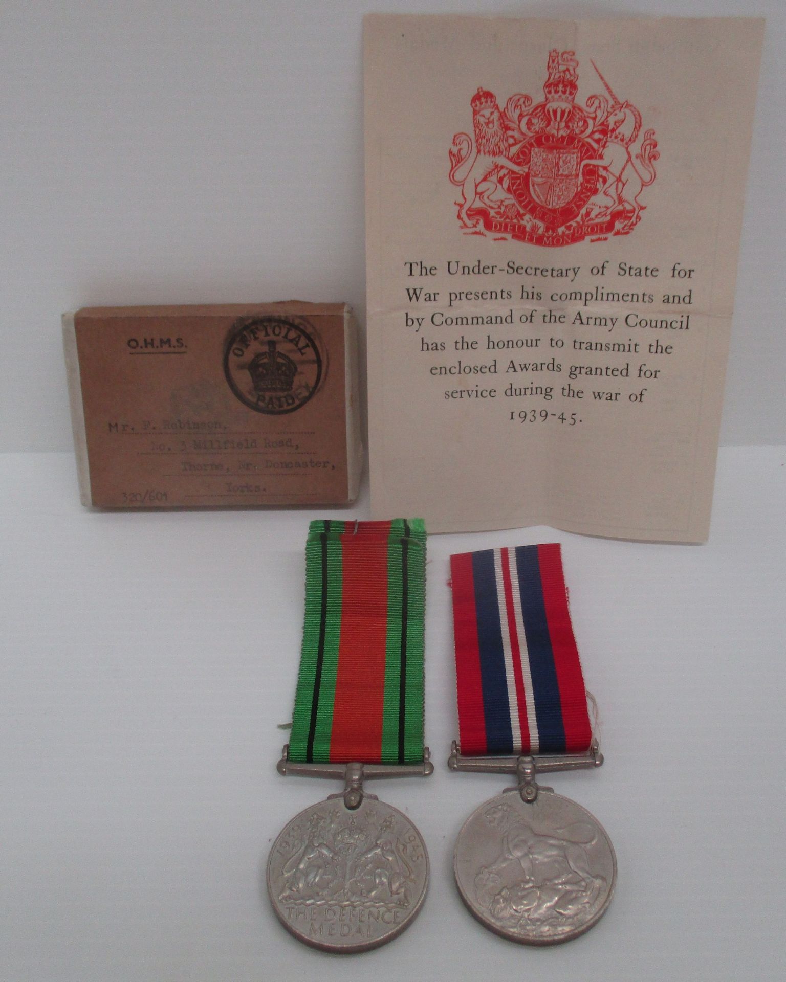 A 1939-45 Defence Medal and War Medal to F.