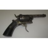 A six shot pin tire pocket revolver with folding trigger leaf scroll engraved cylinder and action