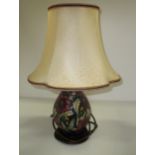 A Moorcroft baluster lamp base in "Pheasant's Eye Pattern", 19 cm.