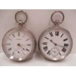 An English lever pocket watch in engine turned silver case and a Waltham movement pocket watch in