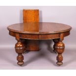 An oak dining suite of - sideboard with low back over a scroll carved frieze,