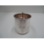 A cylindrical silver half pint mug with flared rim, Birmingham 1939 [approximate weight 4 oz.