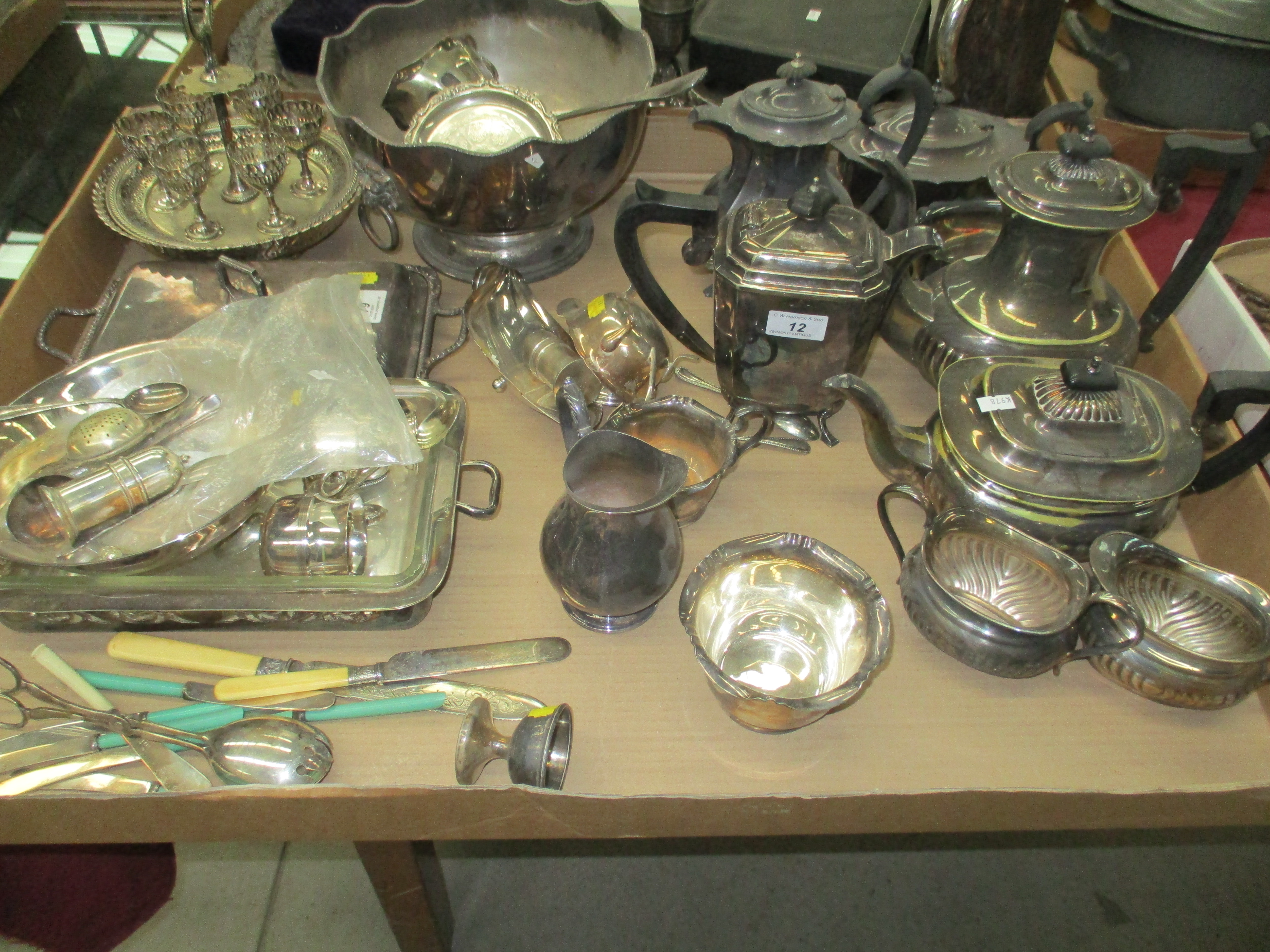 An electro plated four piece tea service, punch bowl,