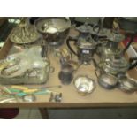 An electro plated four piece tea service, punch bowl,