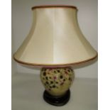 A Moorcroft baluster lamp base in "Tembusu" pattern, 18.