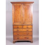 A late 18th century oak cupboard on chest,