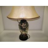 A Moorcroft baluster lamp base in "Sweet Eternity" pattern, 27 cm.