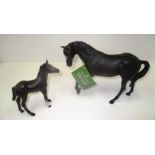 A Royal Doulton "Black Beauty" and foal,