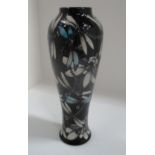 A Moorcroft tall baluster vase in "Clara" pattern 22/100, signed Kerry Goodwin, 26.5 cm.