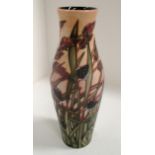 A Moorcroft tall baluster vase in "Savannah" pattern 344/500, signed Emma Bossons, 25.5 cm.