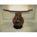 A Moorcroft baluster lamp base "Pheasant's Eye" pattern, 26 cm.