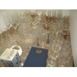 Tray comprising cut and moulded glassware including stem glasses, paperweights,