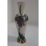 A Moorcroft slender baluster vase in "Persephone" pattern [Collectors' Club] 21 cm.