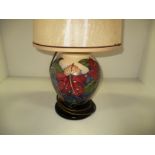 A Moorcroft baluster lamp base in "Simson" pattern, 22 cm.