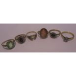 Six 9ct gold stone set dress rings [6] [total approximate weight 14.3g].