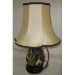 A Moorcroft baluster lamp base in "Queen's Choice" pattern, 21 cm.