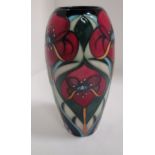 A Moorcroft baluster vase in "Crowning Glory" pattern, signed Rachel Bishop, 10.5 cm.