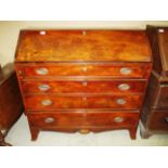 A George III figured mahogany fall front writing bureau, internally fitted, four long graduated,