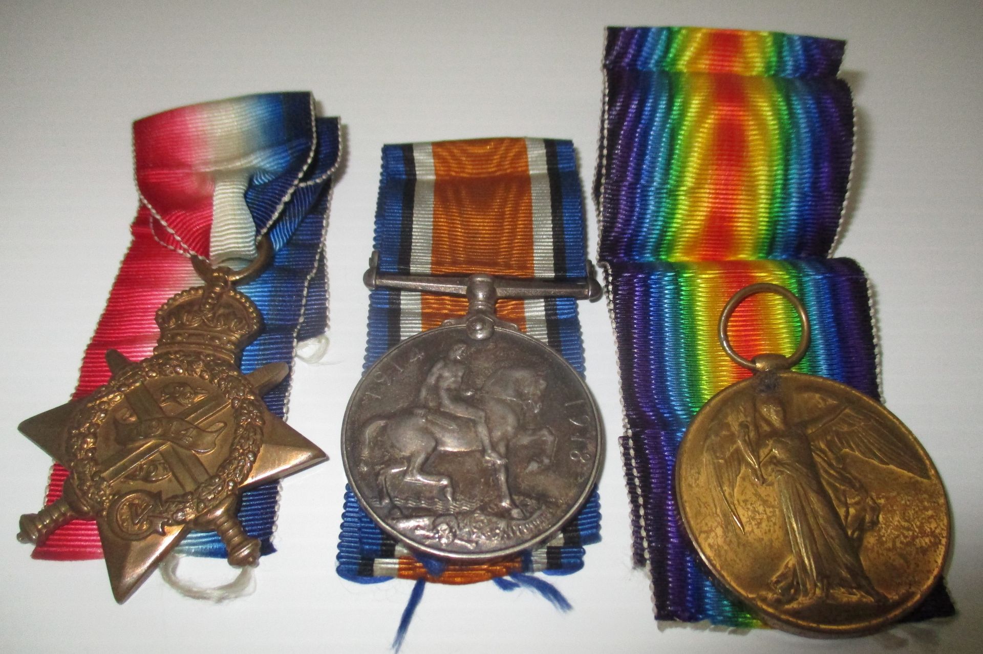 A 1914 Star, War Medal and Victory Medal to 18030 Dvr. W.