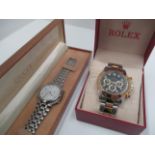 A replica Rolex Oyster perpetual wristwatch on stainless steel and gilt bracelet and a replica