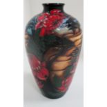 A Moorcroft baluster vase in "Blue Mountain Waratah" trial pattern, signed Vicky Lovatt, 23.5 cm.