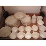 A 40 piece Tuscan china part tea service in leaves and flower pattern