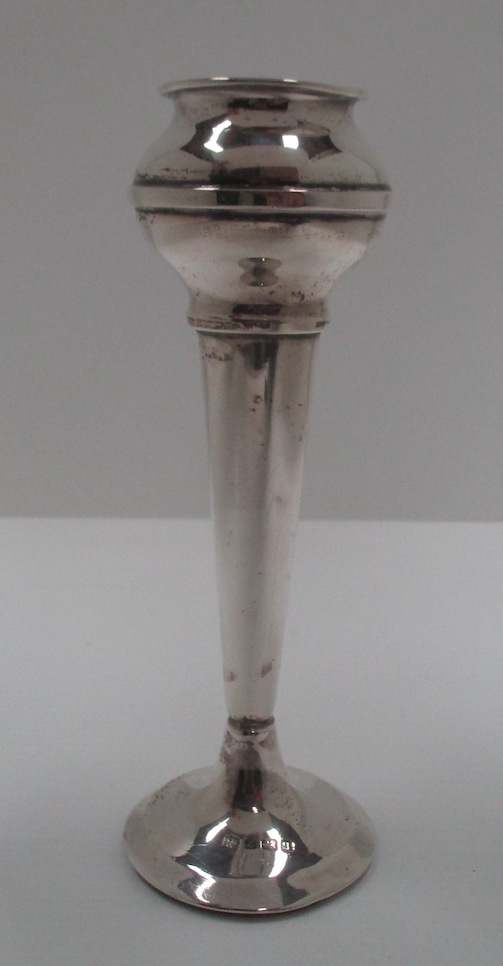 A silver specimen vase with globular top on a tapered body and circular foot, Birmingham 1915,