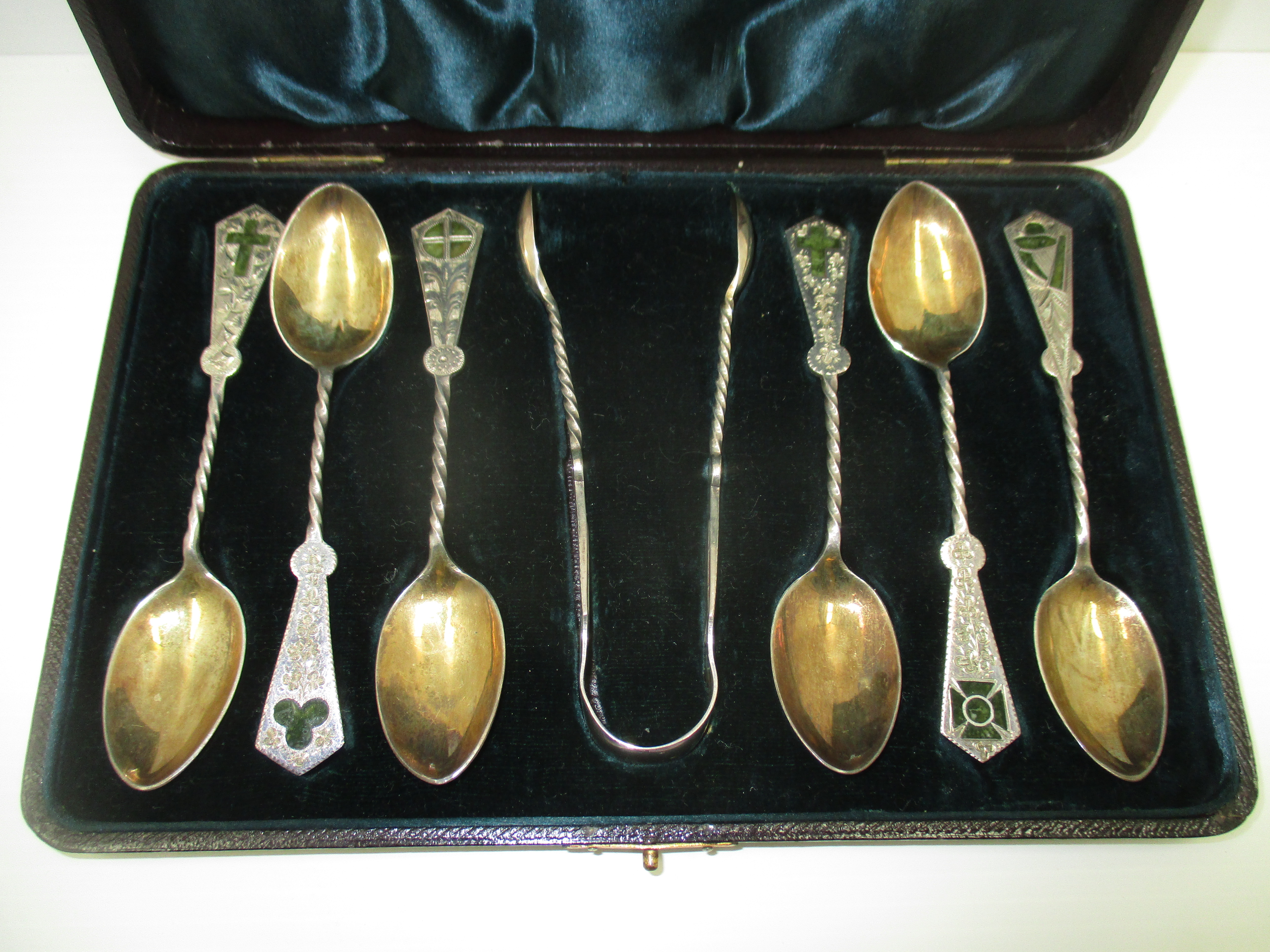 A set of six Victorian silver coffee spoons and tongs,