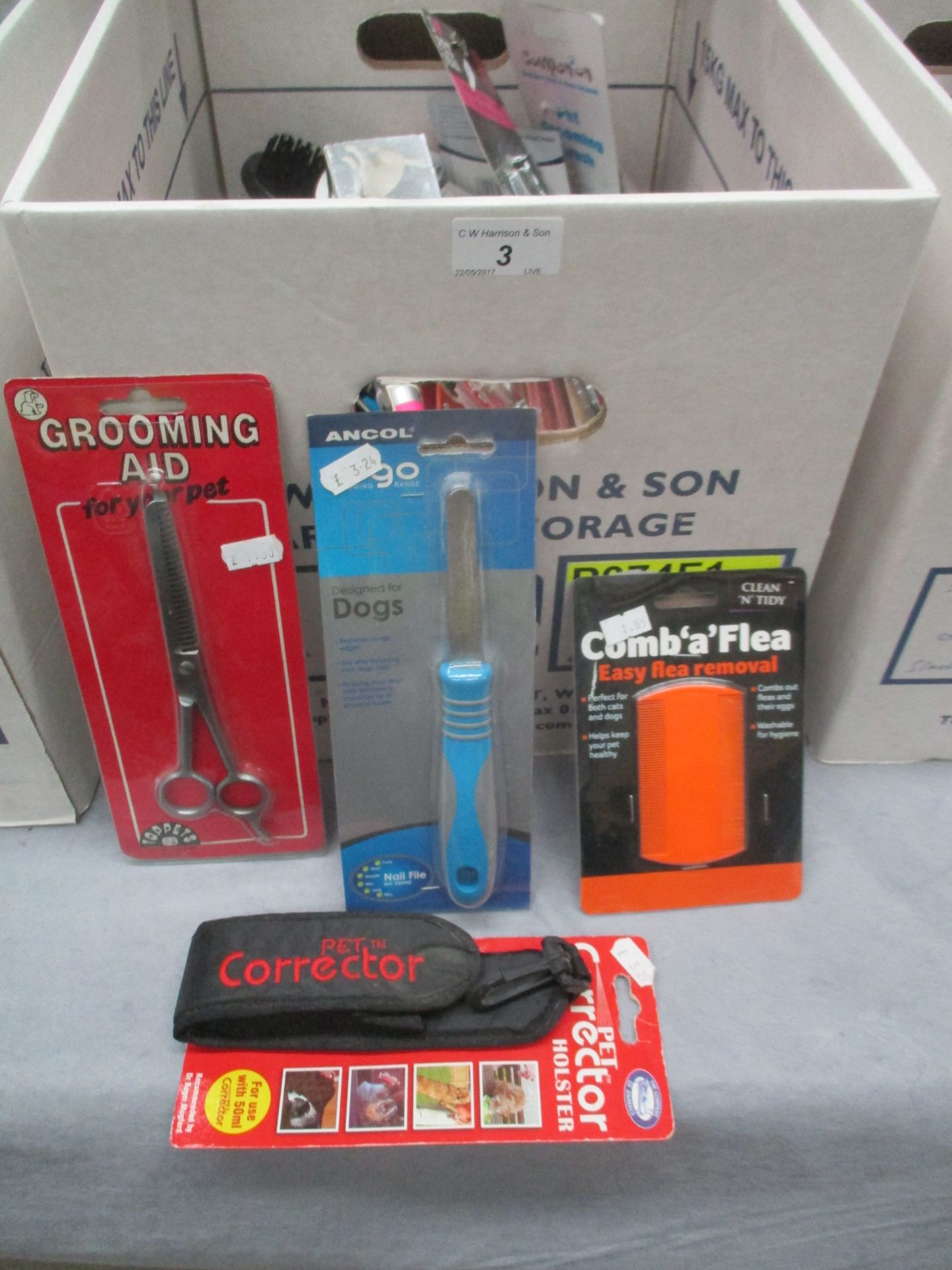 Contents to box - grooming tools, dog brushes, combs,