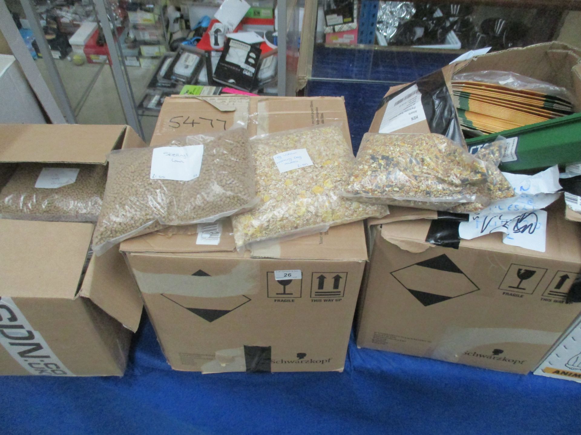 Contents to four boxes - bags of bird food,