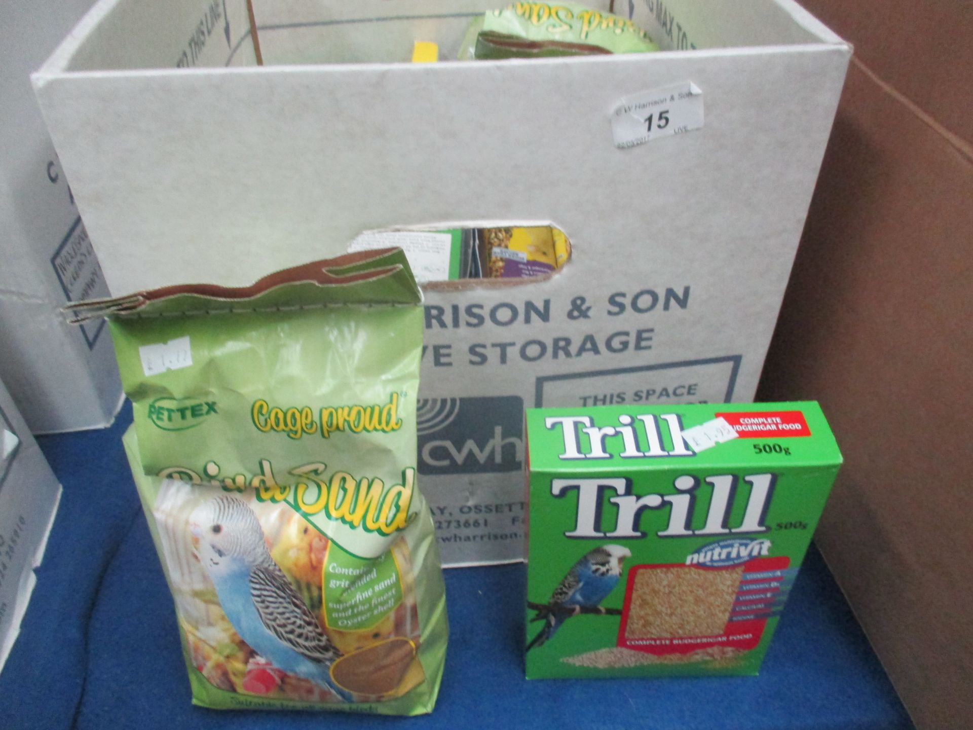 Contents to box - budgie treats, perch covers, sand sheets,