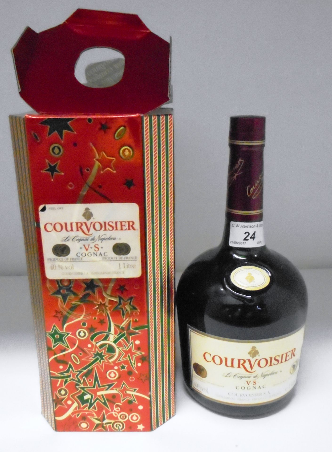 A one litre bottle of Courvoisier V.S.