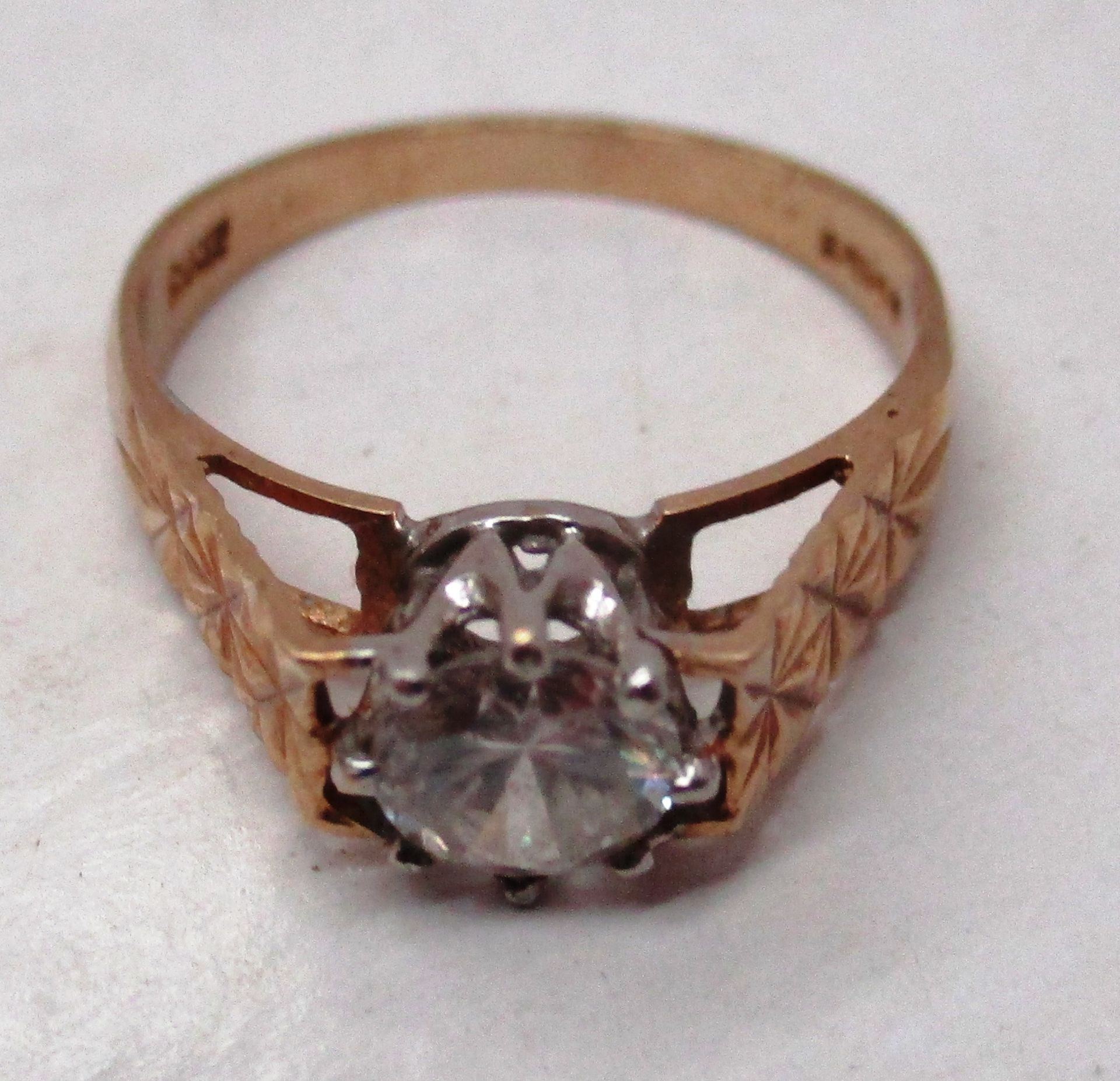 A Solitaire stone 9ct gold engagement ring