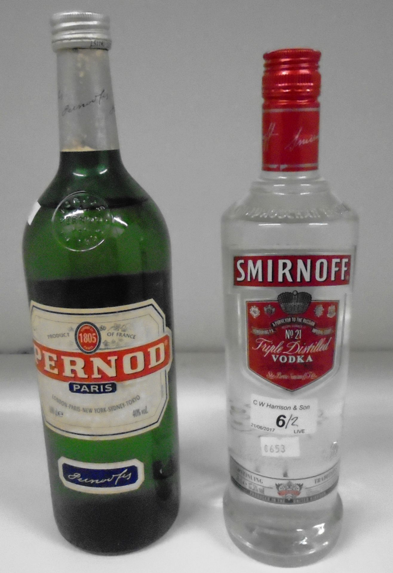 A 100cl bottle of Pernod and a 70cl bottle of Smirnoff No21 Vodka (2)