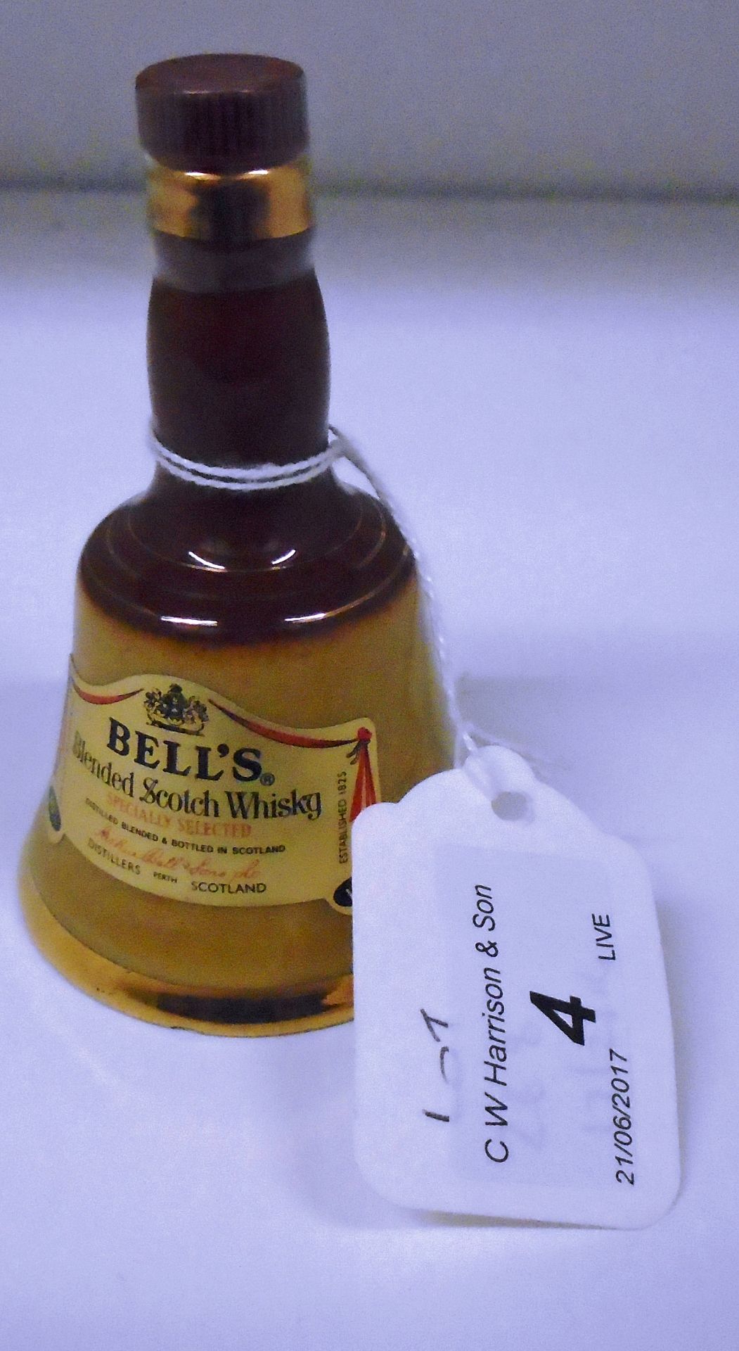 A miniature decanter of Bell's blended Scotch whisky