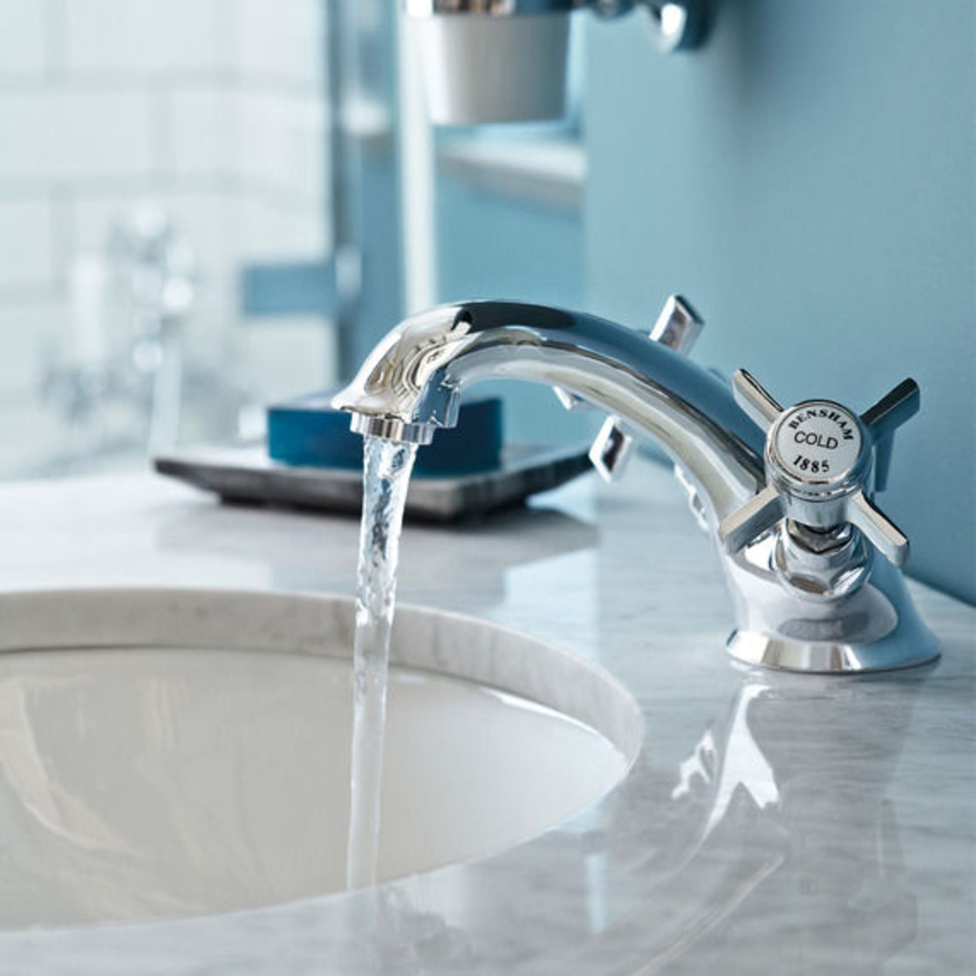 Traditional basin mixer tap with pop-up