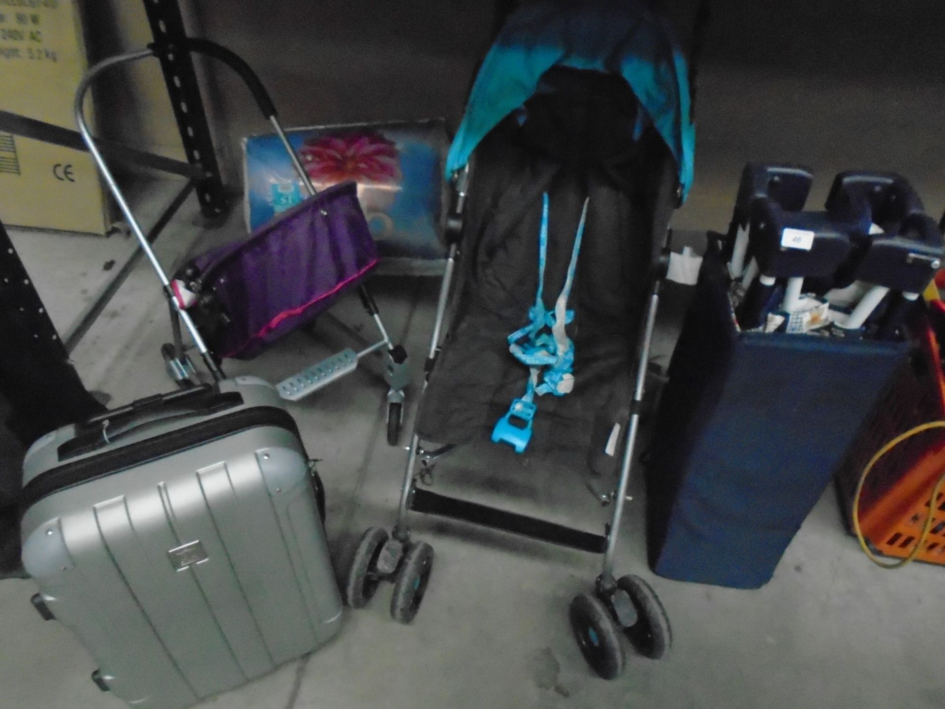 Contents to half rack - Mama's and Papa's stroller, Explore & Go suitcase, pillows,