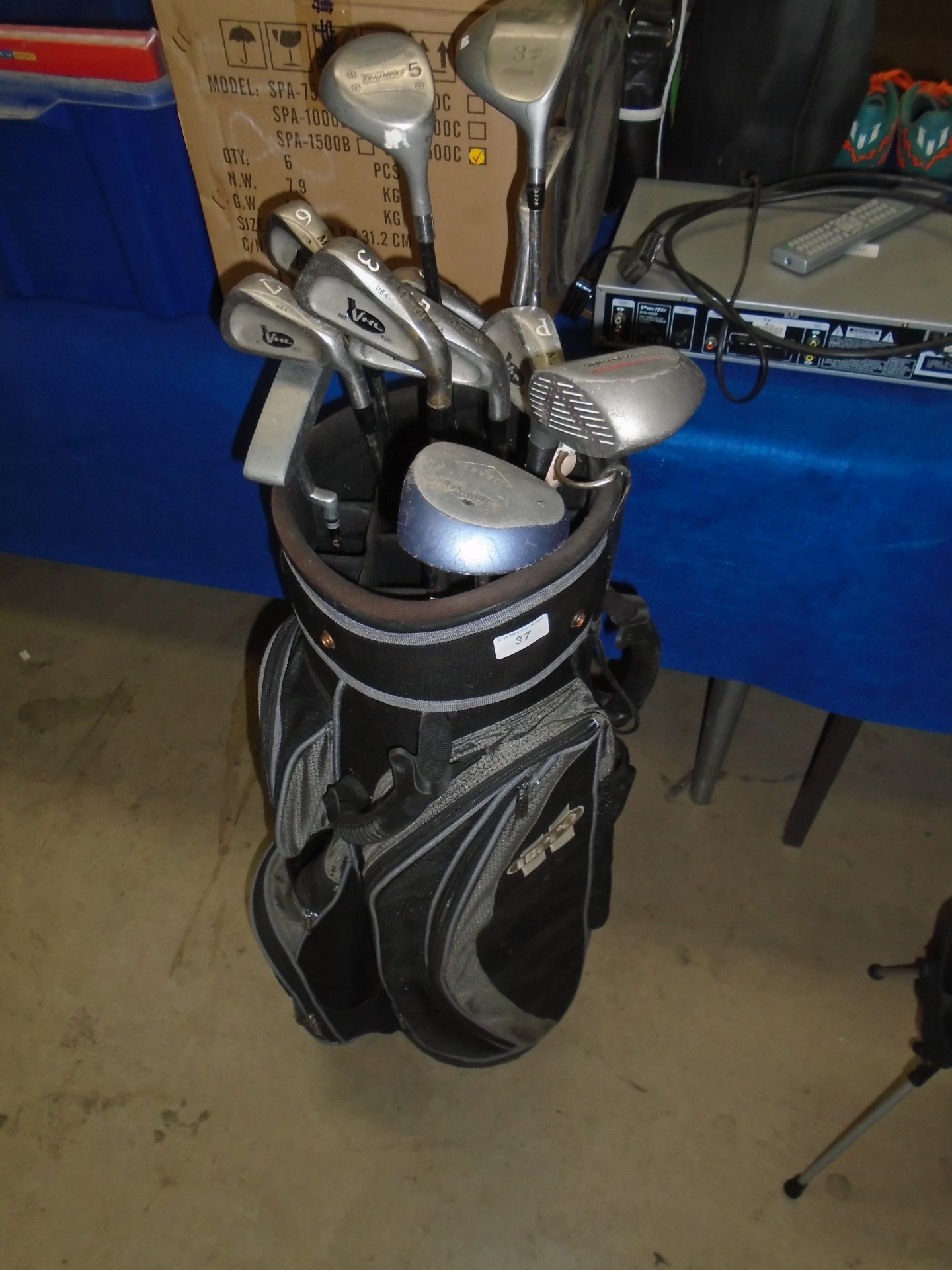 A Hippo black and grey golf stand bag complete with 12 clubs by Howson,