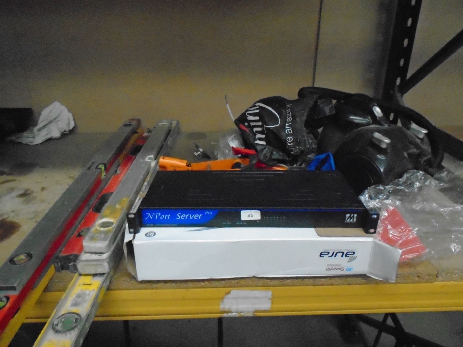 Contents to half rack - spirit levels, vacuum cleaner, N Port server, trolley jack,