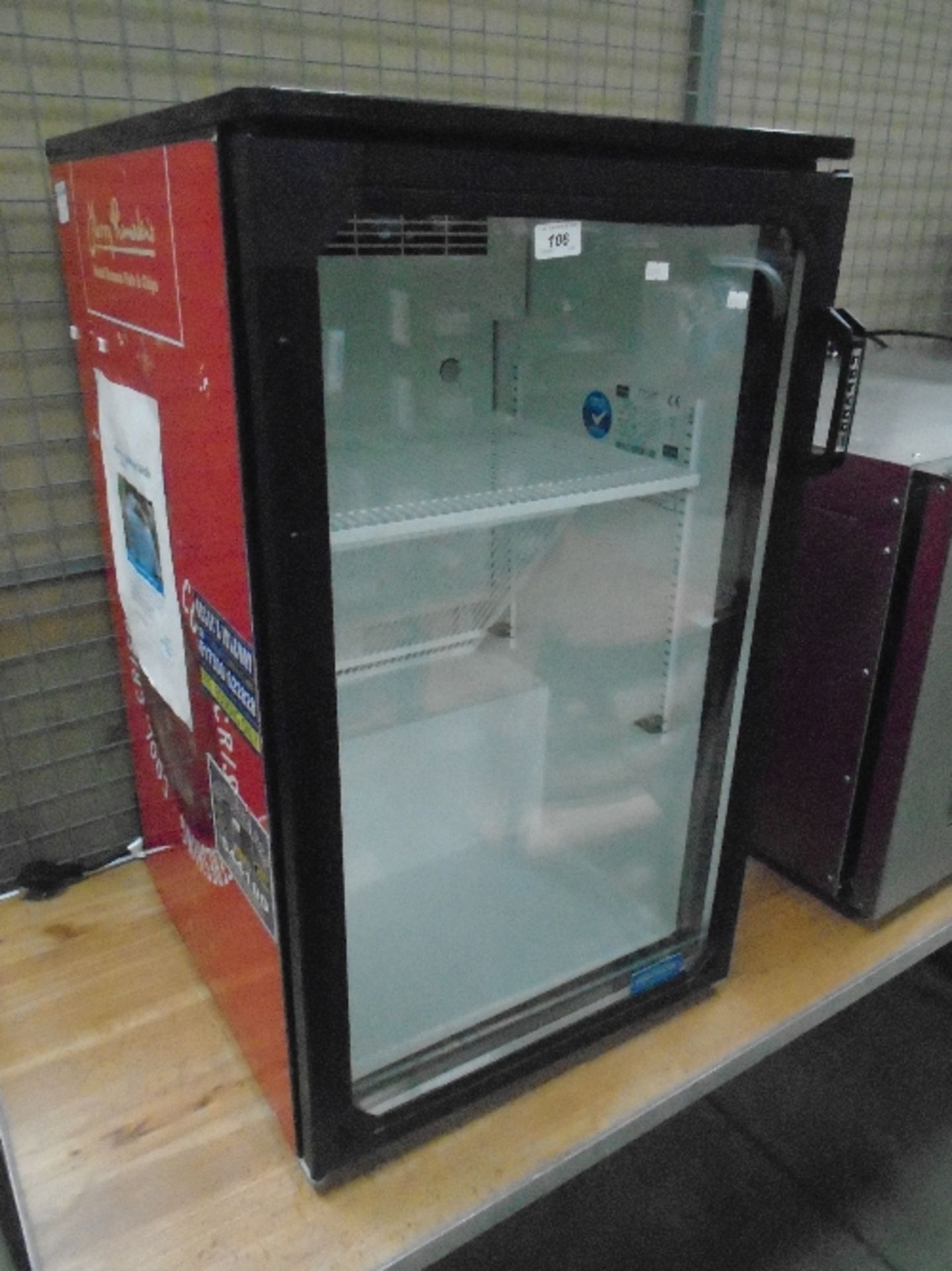 A Frigo Glass stainless steel single door glass front bottle display fridge