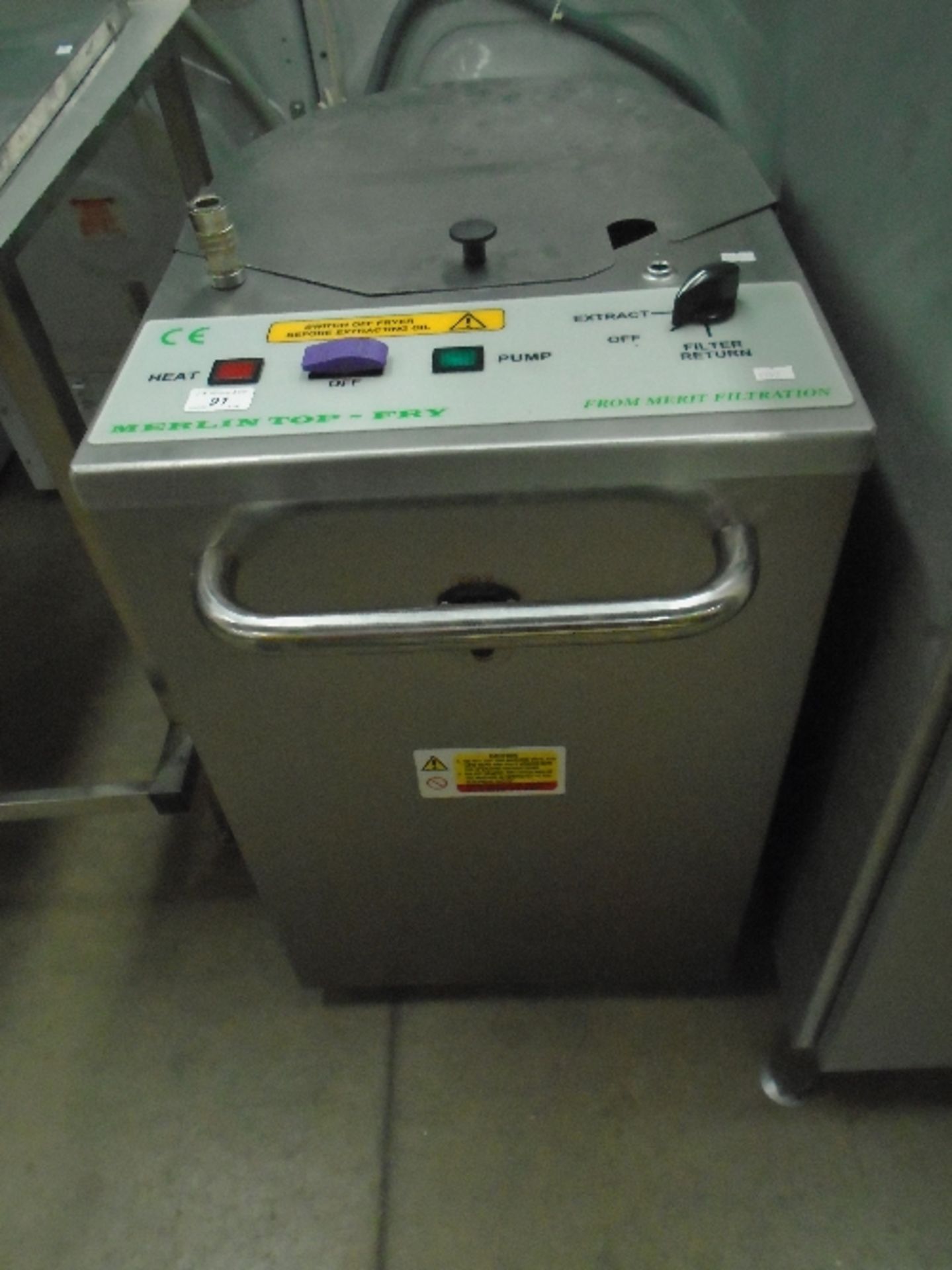 A Merlin stainless steel commercial oil draining machine - 240v