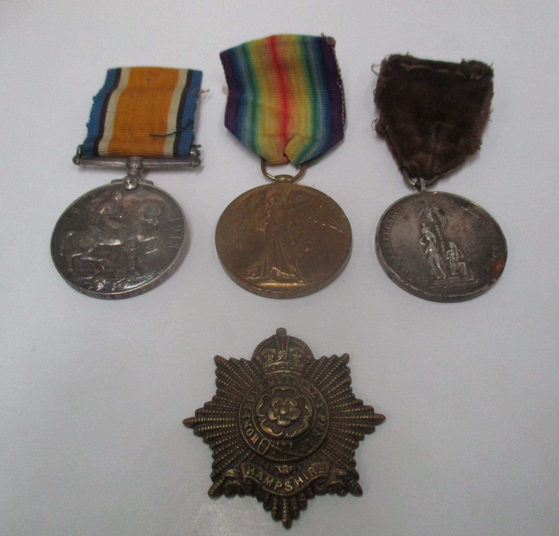 A Victory medal (Q.M & Capt. S. H.