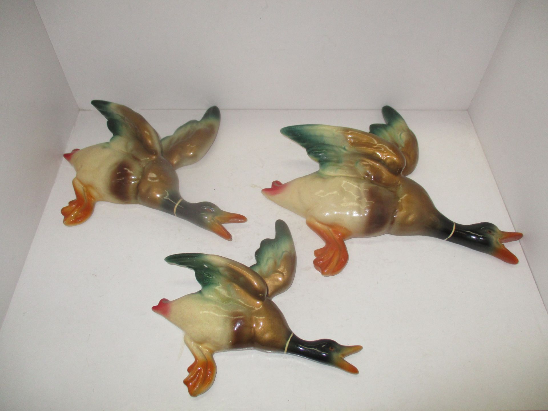 Set of 3 plaster graduated wall hanging flying ducks