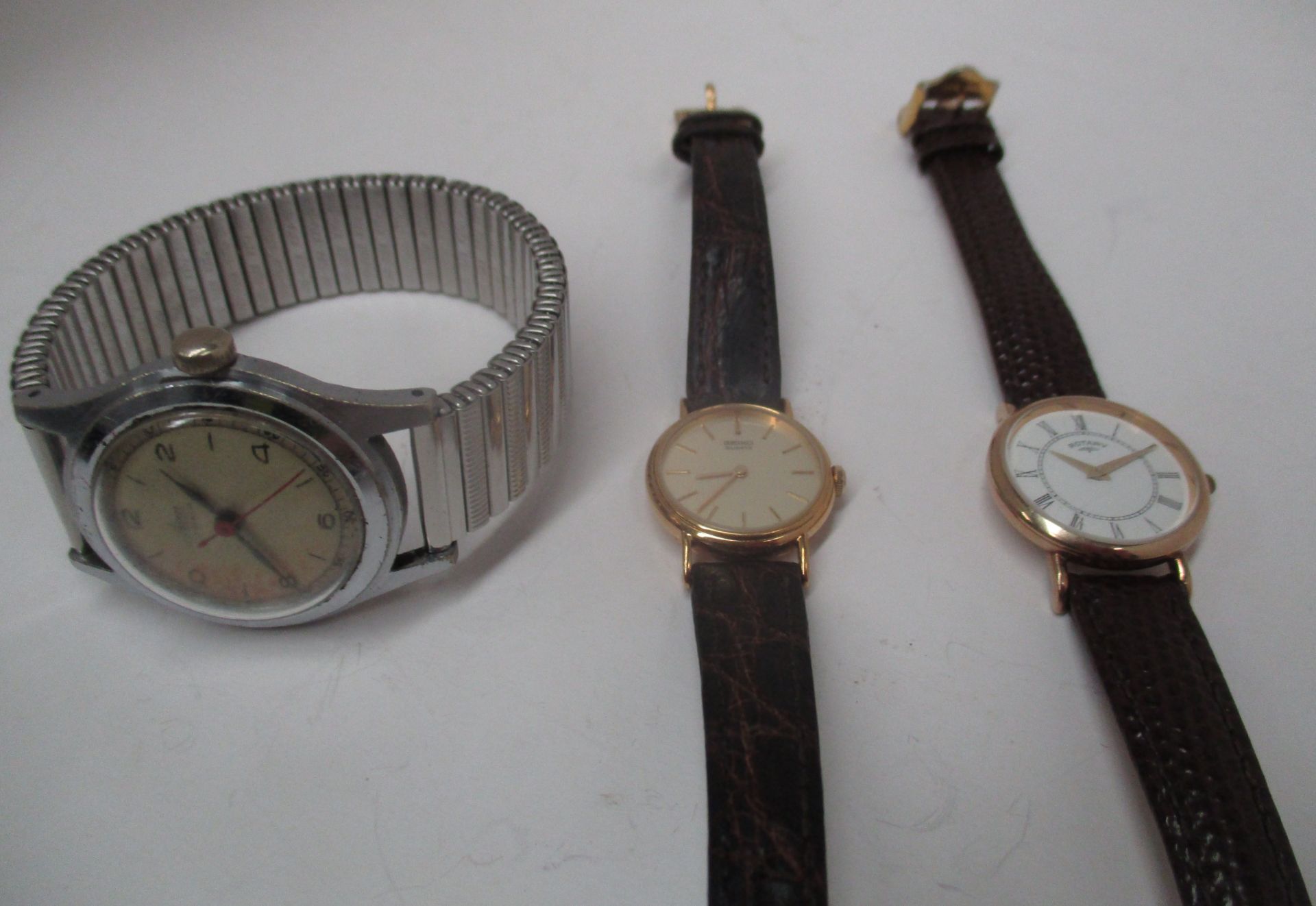 2 x ladies wristwatches - a Seiko with 9ct gold case and brown leather strap and a Rotary with 9ct